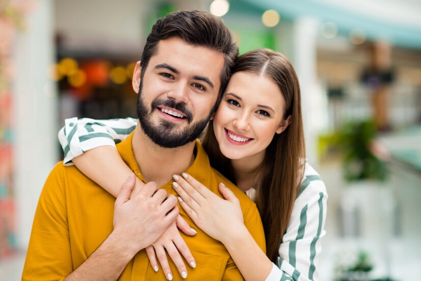 Full-time cuddler providing comforting therapy during a group cuddle party, offering support and relaxation to clients